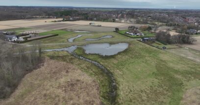luchtfoto van zandafgraving Zanderij in Castricum